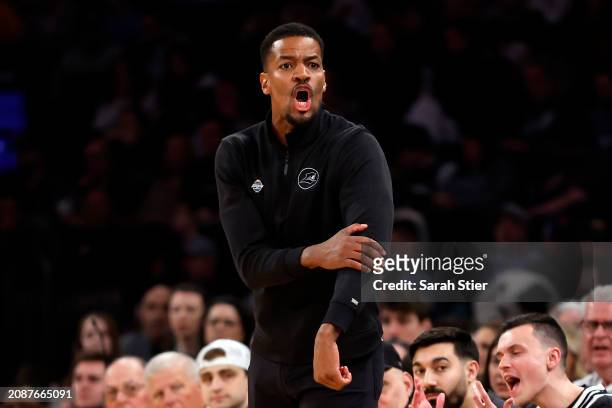 Head coach Kim English of the Providence Friars reacts in the first half against the Marquette Golden Eagles during the Semifinal round of the Big...