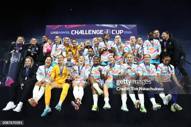 San Diego Wave FC players and coaches pose for a team photo after defeating NJ/NY Gotham FC to win the NWSL Challenge Cup at Red Bull Arena on March...