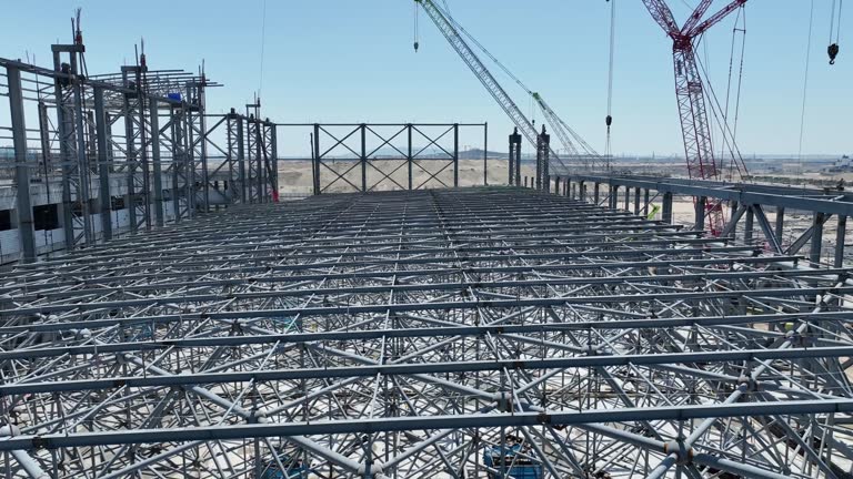 https://media.gettyimages.com/id/2087677827/video/factory-steel-structure-roof.jpg?b=1&s=640x640&k=20&c=M4dD1MVHoSvrxq_7gnxEM0XuuD8W3HIOdzzulrjqZ34=
