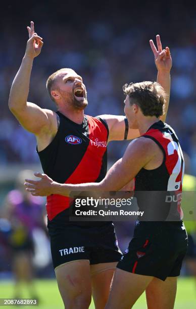Jake Stringer of the Bombers celebrates kicking a goal during the round one AFL match between Essendon Bombers and Hawthorn Hawks at Melbourne...