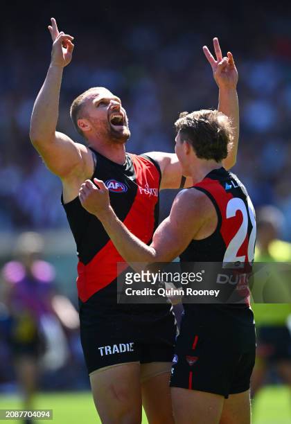 Jake Stringer of the Bombers celebrates kicking a goal during the round one AFL match between Essendon Bombers and Hawthorn Hawks at Melbourne...