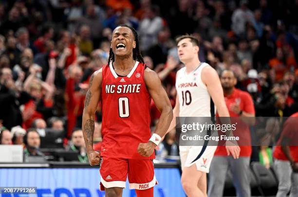 Horne of the North Carolina State Wolfpack celebrates in overtime against the Virginia Cavaliers in the Semifinals of the ACC Men's Basketball...