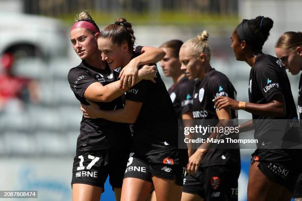 Deborah-Anne De la Harpe of Brisbane Roar celebrates after scoring the team's first goal with teammate Leah Scarpelli during the A-League Women round...