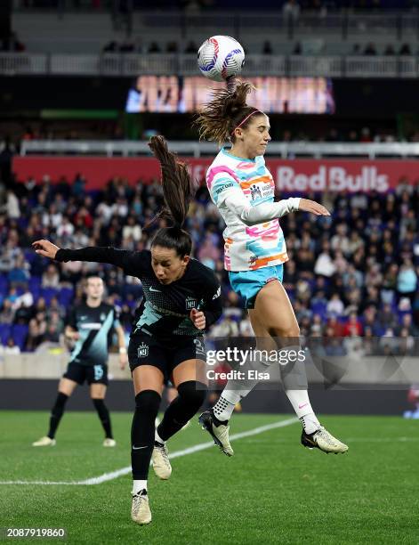 Bruninha of the NY/NJ Gotham FC and Alex Morgan of the San Diego Wave FC go after the ball during the second half of the 2024 NWSL Challenge Cup at...