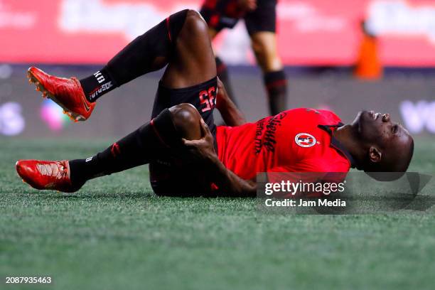 Kevin Balanta of Tijuana lies in the pitch during the 12th round match between Tijuana and Santos Laguna as part of the Torneo Clausura 2024 Liga MX...