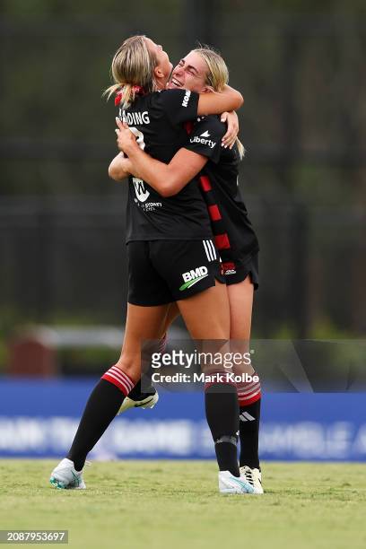 Sophie Harding of the Wanderers celebrates with Danika Matos of the Wanderers after scoring a goal during the A-League Women round 20 match between...