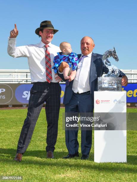 Owner Tony Ottobre poses with trainer Ciaron Maher after Pride of Jenni won Race 8, the The Sharp Eit All-star Mile, during The All-Star Mile Race...