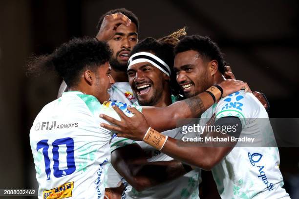 Iosefo Masi of the Fijian Drua celebrates after scoring a try during the round four Super Rugby Pacific match between Chiefs and Fijian Drua at FMG...
