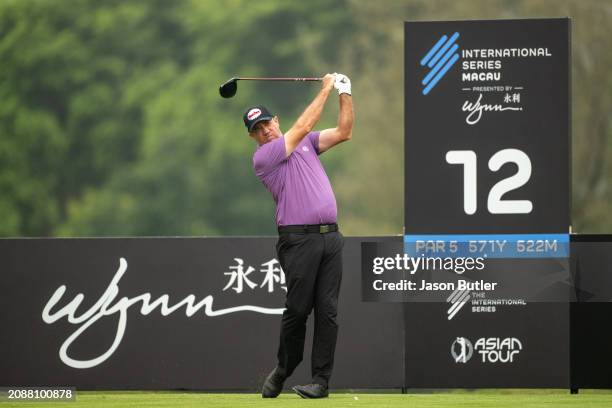 Scott Hend of Australia tees off on hole 12 during the third round of International Series Macau at Macau Golf and Country Club on March 16, 2024 in...