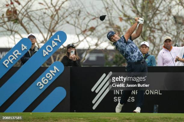 Patrick Reed of the United States tees off on hole 1 during the third round of International Series Macau at Macau Golf and Country Club on March 16,...