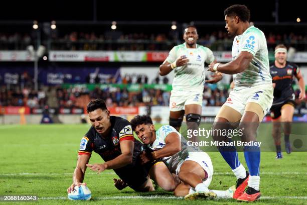 Shaun Stevenson of the Chiefs scores a try during the round four Super Rugby Pacific match between Chiefs and Fijian Drua at FMG Stadium Waikato, on...