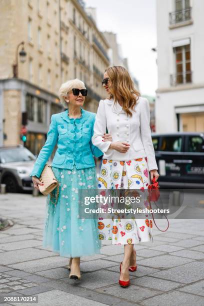 Marie Monique Lapp is seen wearing a light blue full look by Maison common, a beige bag by Chanel, For Arts Sake sunglasses in black and vintage...