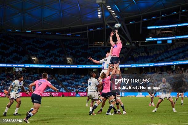 Players contest a line out during the round four Super Rugby Pacific match between NSW Waratahs and Blues at Allianz Stadium, on March 16 in Sydney,...