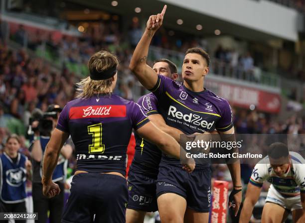 William Warbrick of the Storm celebrates after scoring a try during the round two NRL match between Melbourne Storm and New Zealand Warriors at AAMI...