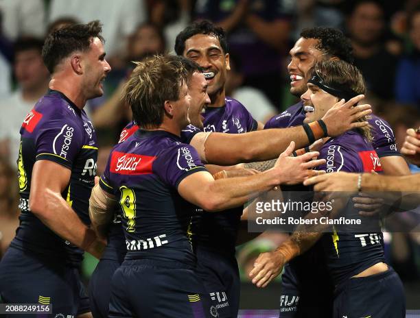 Ryan Papenhuyzen of the Storm celebrates after scoring a try during the round two NRL match between Melbourne Storm and New Zealand Warriors at AAMI...
