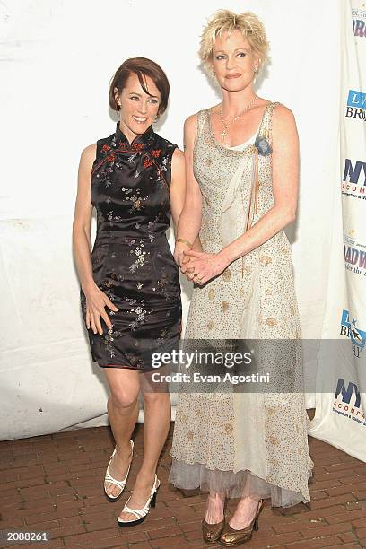 Co-hosts Mary Stuart Masterson and actress Melanie Griffith attend AOL Time Warner Presents 'Broadway Under The Stars,' a free concert in Bryant Park...