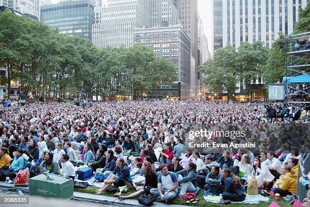 The audience listen as they sit at AOL Time Warner Presents 'Broadway Under The Stars' - A free concert in Bryant Park June 16, 2003 in New York City.