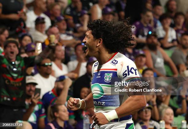 Dallin Watene-Zelezniak of the Warriors celebrates after scoring a try during the round two NRL match between Melbourne Storm and New Zealand...