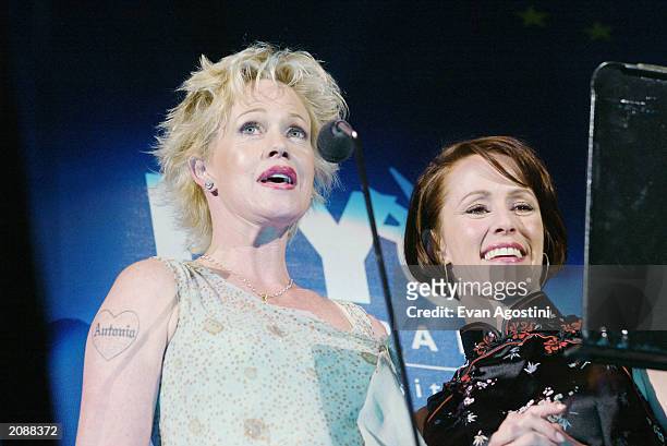 Actresses Melanie Griffith and Mary Stuart Masterson introduce the next act during AOL Time Warner Presents 'Broadway Under The Stars' - A free...