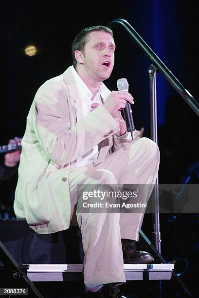 Singer Raul Esparza performs at AOL Time Warner Presents 'Broadway Under The Stars' - A free concert in Bryant Park June 16, 2003 in New York City.