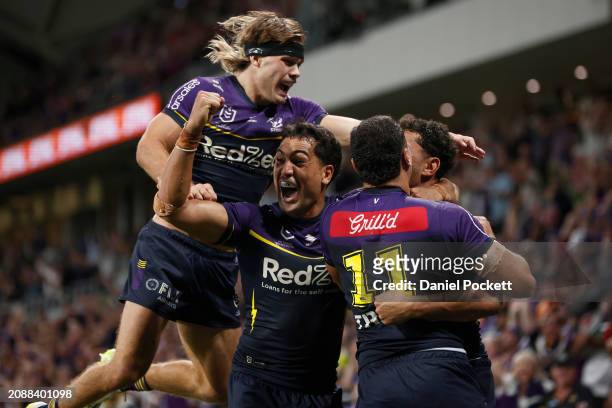 Xavier Coates of the Storm celebrates scoring the match winning try during the round two NRL match between Melbourne Storm and New Zealand Warriors...