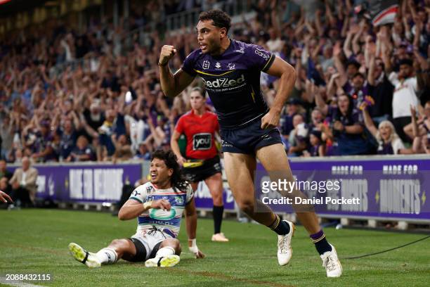 Xavier Coates of the Storm celebrates scoring the match winning try during the round two NRL match between Melbourne Storm and New Zealand Warriors...