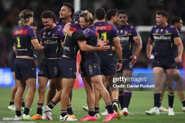 The Storm celebrate winning the round two NRL match between Melbourne Storm and New Zealand Warriors at AAMI Park, on March 16 in Melbourne,...