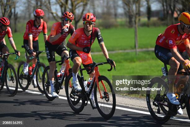 Michal Kwiatkowski of Poland and Team INEOS Grenadiers competes carrying the feed for his teammates during the 115th Milano-Sanremo 2024 a 288km, one...