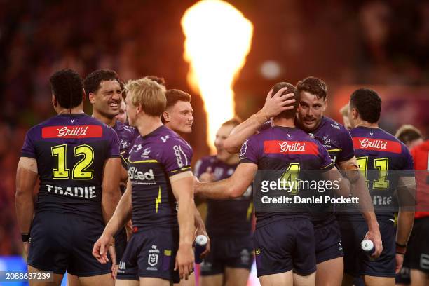 The Storm celebrate winning the round two NRL match between Melbourne Storm and New Zealand Warriors at AAMI Park, on March 16 in Melbourne,...