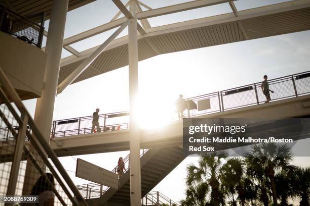 Boston Red Sox fans walk through the concourse before a game against the Minnesota Twins at JetBlue Park at Fenway South on March 15, 2024 in Fort...