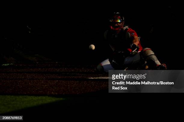 Connor Wong of the Boston Red Sox catches in the bullpen before a game against the Minnesota Twins at JetBlue Park at Fenway South on March 15, 2024...