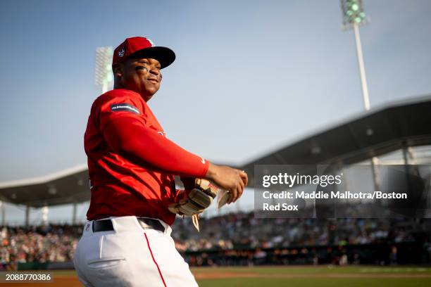 Rafael Devers of the Boston Red Sox takes the field for a game against the Minnesota Twins at JetBlue Park at Fenway South on March 15, 2024 in Fort...