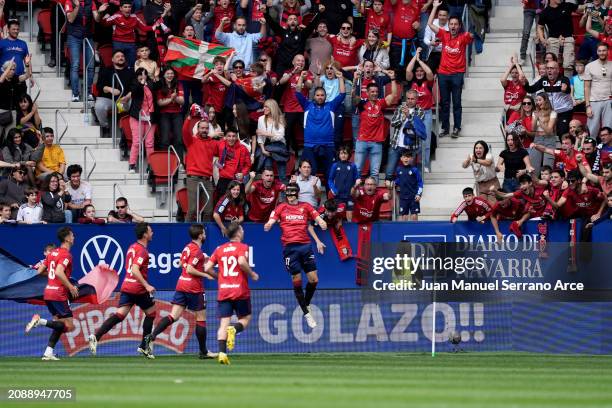 Ante Budimir of CA Osasuna celebrates scoring his team's first goal with teammates during the LaLiga EA Sports match between CA Osasuna and Real...