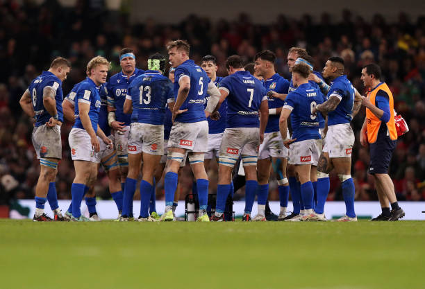 Players of Italy huddle after Lorenzo Pani of Italy scores his team's second try during the Guinness Six Nations 2024 match between Wales and Italy...