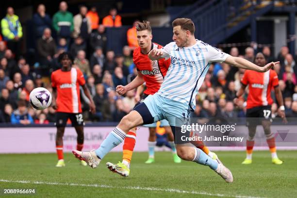 Chris Wood of Nottingham Forest scores his team's first goal during the Premier League match between Luton Town and Nottingham Forest at Kenilworth...