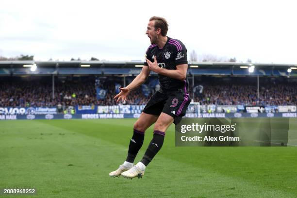 Harry Kane of Bayern Munich celebrates scoring his team's second goal during the Bundesliga match between SV Darmstadt 98 and FC Bayern München at...