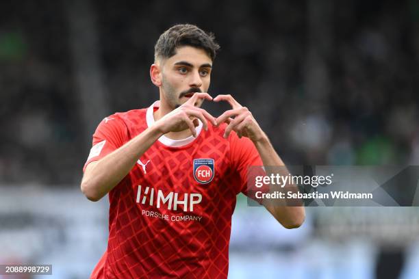 Eren Dinkci of 1.FC Heidenheim celebrates scoring his team's first goal during the Bundesliga match between 1. FC Heidenheim 1846 and Borussia...