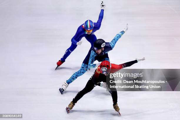 Xiaojun Lin of China, Denis Nikisha of Kazakhstan and Jordan Piaerre-Gilles of Canada compete in the Men 500m Final during ISU World Short Track...