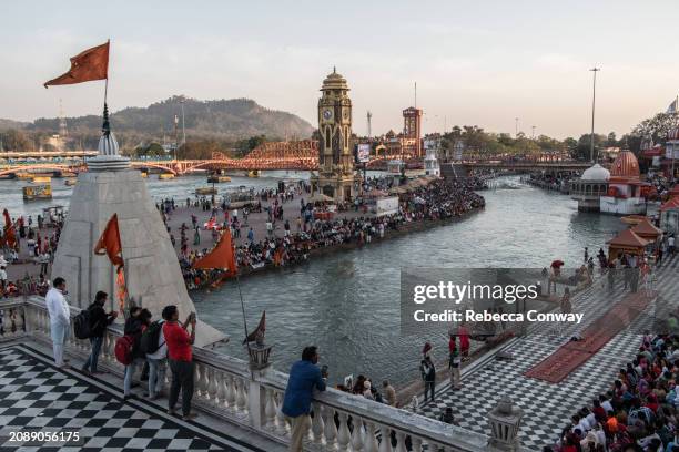 Indian Hindu devotees gather to bathe and offer prayers at the Har Ki Pauri ghat on the River Ganges on the on March 15, 2024 in Haridwar, India. The...