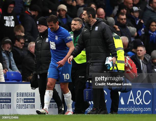 Lukas Jutkiewicz of Birmingham City goes off injured during the Sky Bet Championship match between Birmingham City and Watford at St Andrews on March...