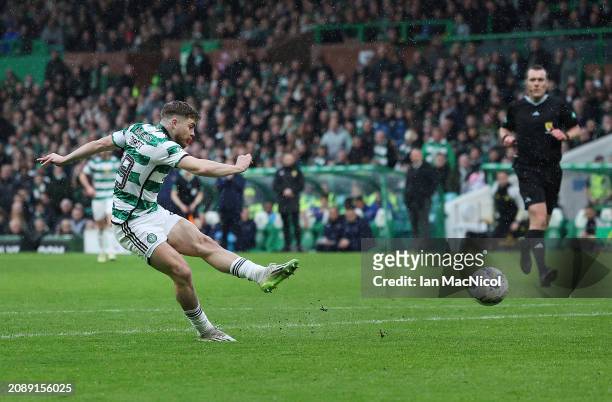 James Forrest of Celtic scores his team's third goal during the Cinch Scottish Premiership match between Celtic FC and St. Johnstone FC at Celtic...