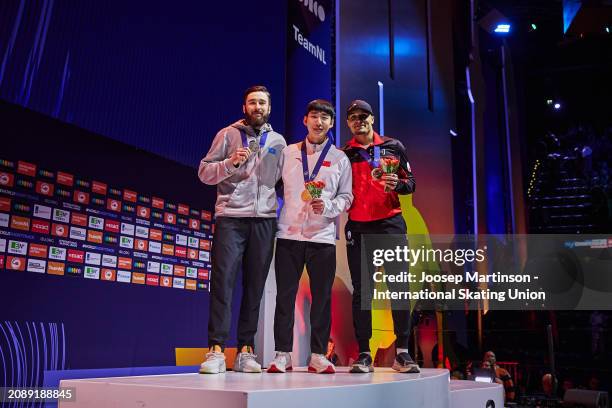 Denis Nikisha of Kazakhstan poses with the silver medal, Xiaojun Lin of China with the gold medal and Jordan Pierre-Gilles of Canada with the bronze...