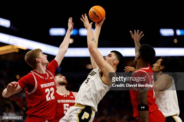 Zach Edey of the Purdue Boilermakers shoots the ball against the Wisconsin Badgers in the first half of the Semifinals of the Big Ten Tournament at...
