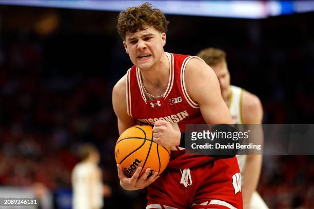 Max Klesmit of the Wisconsin Badgers celebrates against the Purdue Boilermakers in the first half of the Semifinals of the Big Ten Tournament at...