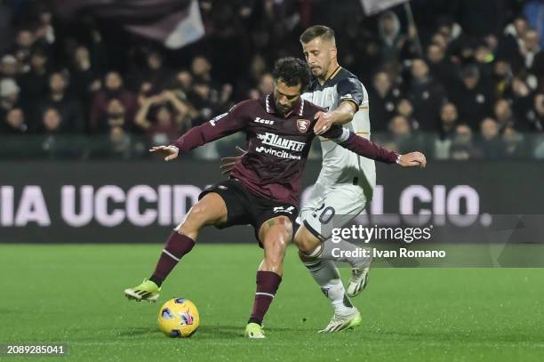 Antonio Candreva of US Salernitana and Ylber Ramadani of US Lecce compete for the ball during the Serie A TIM match between US Salernitana and US...