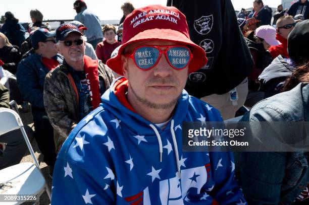 Guests arrive for a rally with Republican presidential candidate former President Donald Trump at the Dayton International Airport on March 16, 2024...