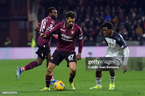 Antonio Candreva of US Salernitana and Patrick Dorgu of US Lecce compete for the ball during the Serie A TIM match between US Salernitana and US...