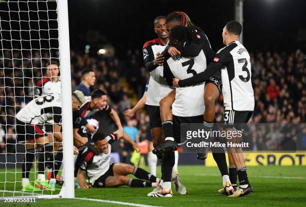 Fulham players celebrate after Rodrigo Muniz of Fulham scores his team's third goal during the Premier League match between Fulham FC and Tottenham...