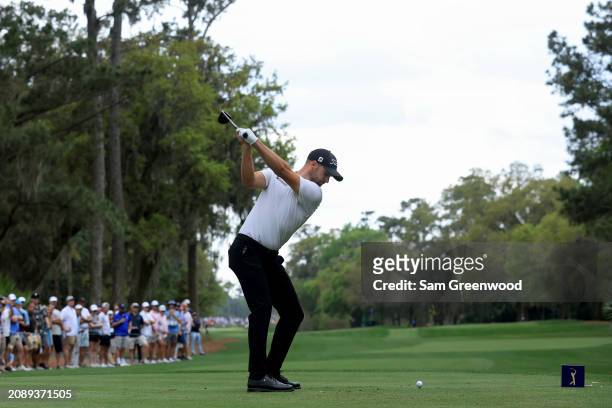 Wyndham Clark of the United States plays his shot from the second tee during the third round of THE PLAYERS Championship at TPC Sawgrass on March 16,...