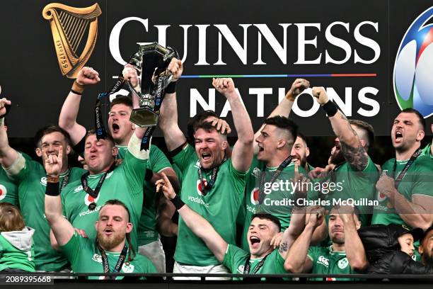 Peter O'Mahony of Ireland lifts the Six Nations Trophy following the team's victory during the Guinness Six Nations 2024 match between Ireland and...